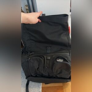 Tumi Black Men's Backpack with Dual Zipper Pockets